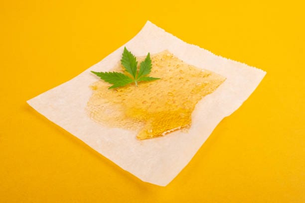 marijuana resin concentrate, yellow amber color cannabis wax